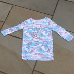 a justice long sleeved blue and gray camo top
